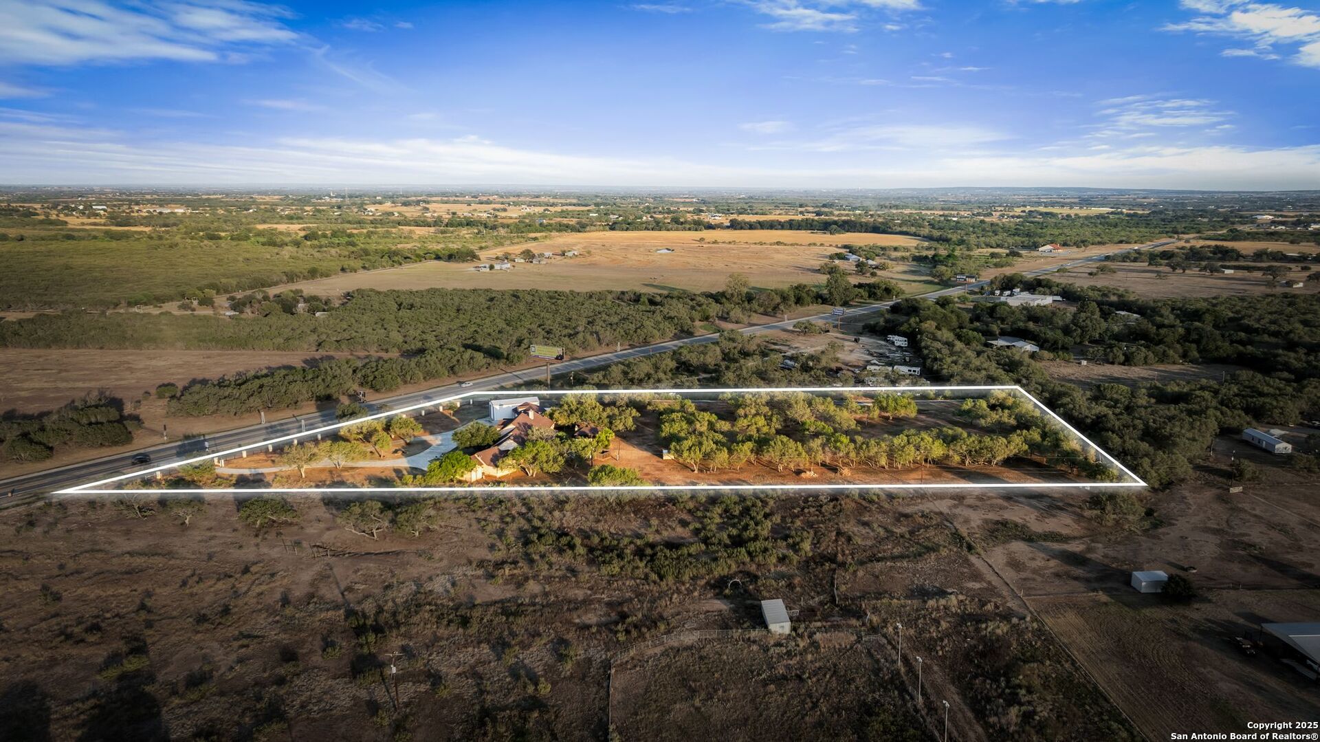 765 Highway 1604 Loop St. Hedwig, TX 78101 - Photo 49 of 50 a view of a swimming pool and city view