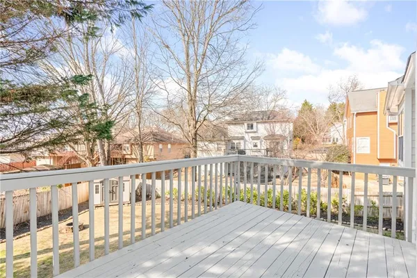 a view of a backyard with wooden floor