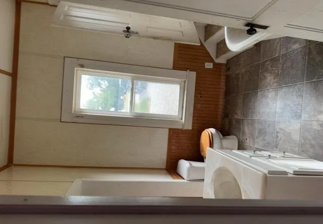 a bathroom with a sink and mirror