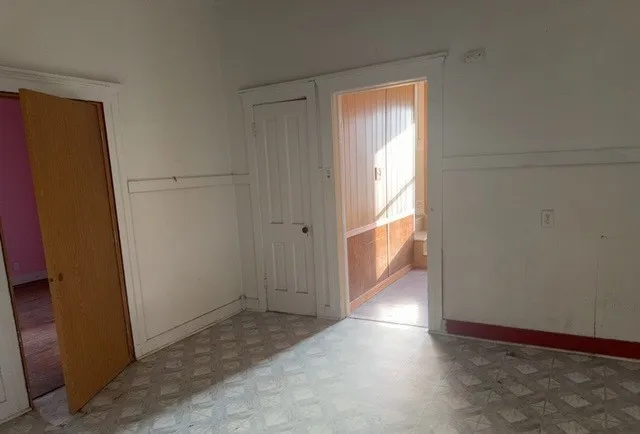 an empty room with windows