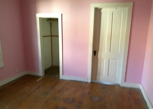 an empty room with windows