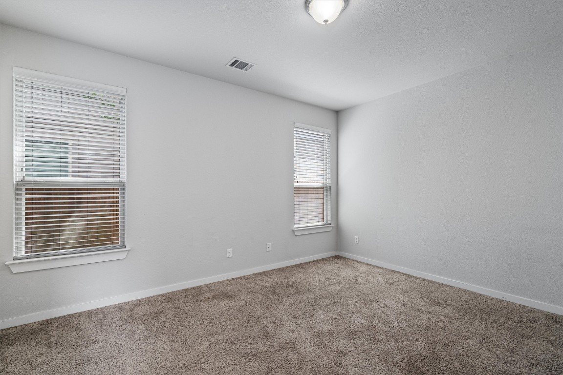 16304 Travesia Way Austin, TX 78728 - Photo 16 of 33 an empty room with a window