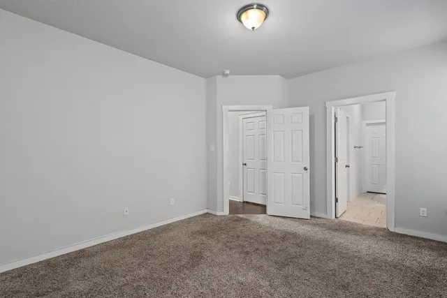 a bathroom with a shower and bathtub