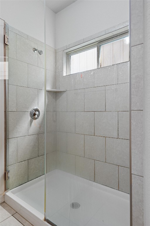 16304 Travesia Way Austin, TX 78728 - Photo 19 of 33 a bathroom with a shower and bathtub