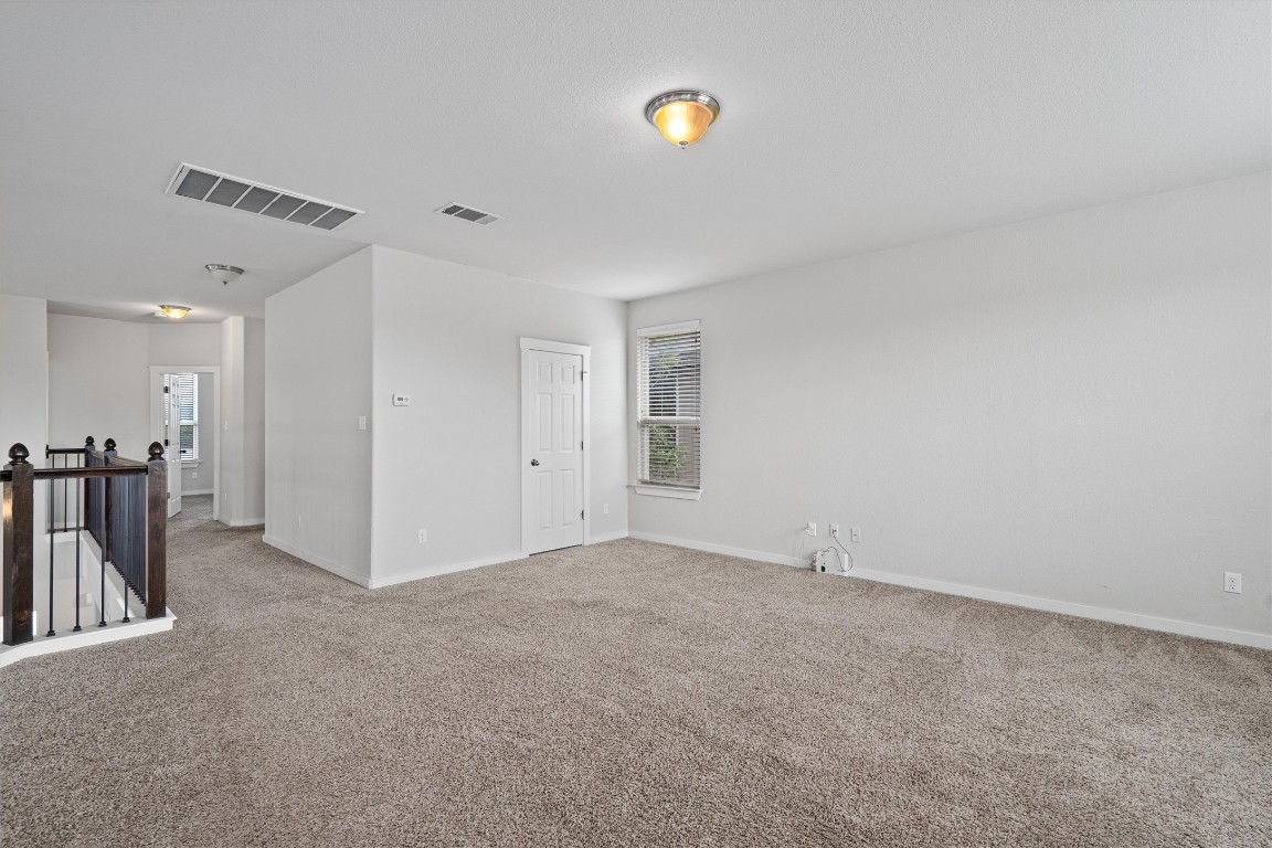 16304 Travesia Way Austin, TX 78728 - Photo 22 of 33 a view of empty room