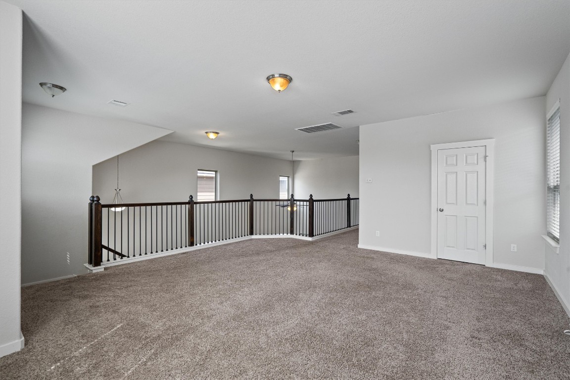 16304 Travesia Way Austin, TX 78728 - Photo 23 of 33 a view of empty room