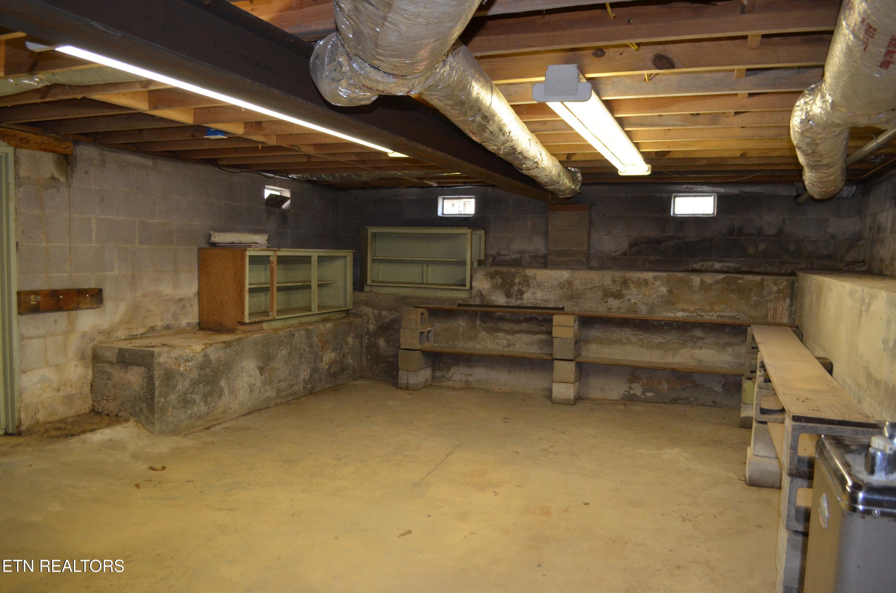 106 Cedar Lane Oak Ridge, TN 37830 - Photo 25 of 31 Unifinished basement area - walkout