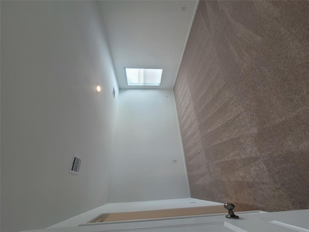 105 Painted Night Road Hutto, TX 78634 - Photo 7 of 8 an empty room with windows