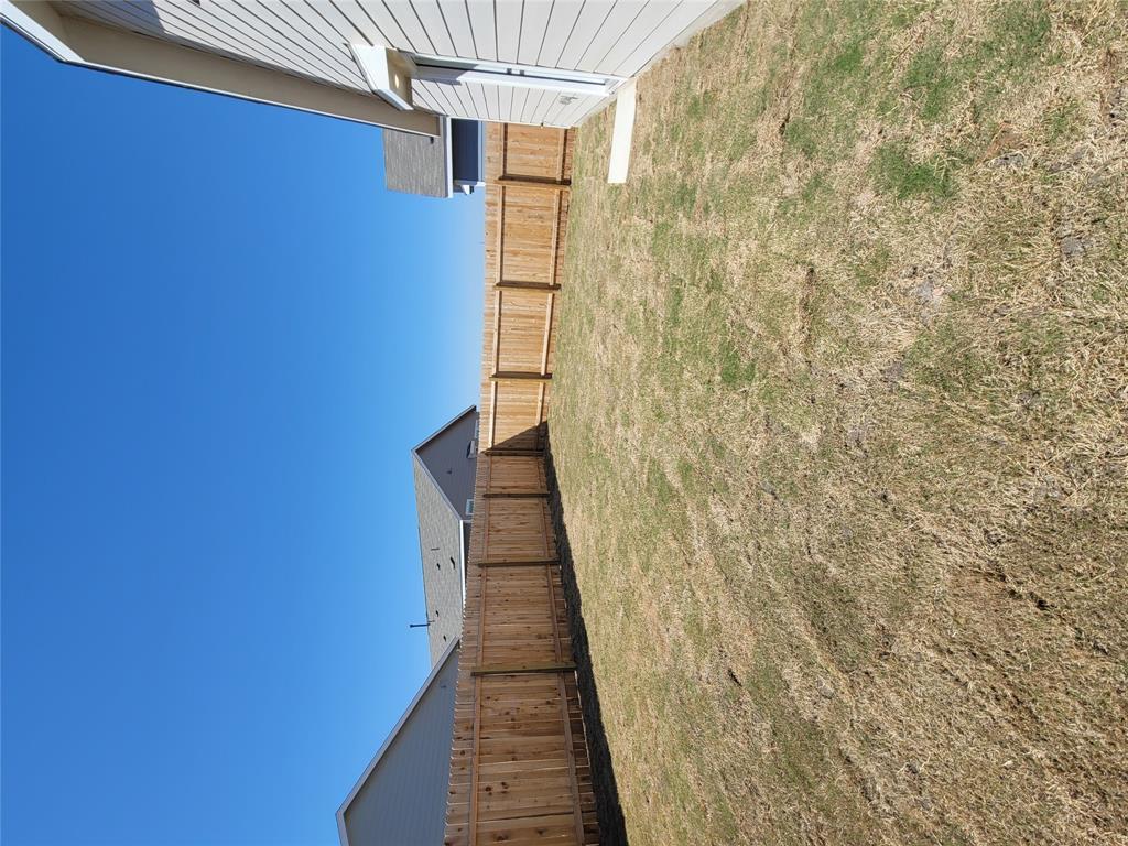 105 Painted Night Road Hutto, TX 78634 - Photo 8 of 8 a view of a backyard