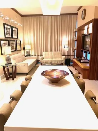 a bed room with a bed and a large window