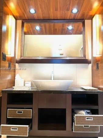 a kitchen with a sink and a microwave