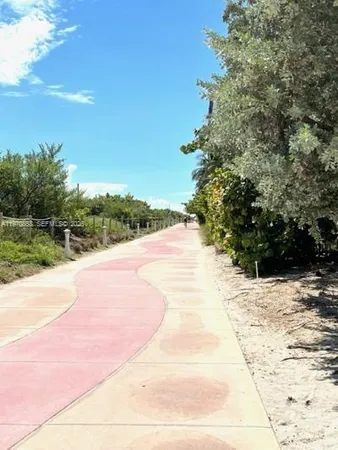 a view of a road with an outdoor space