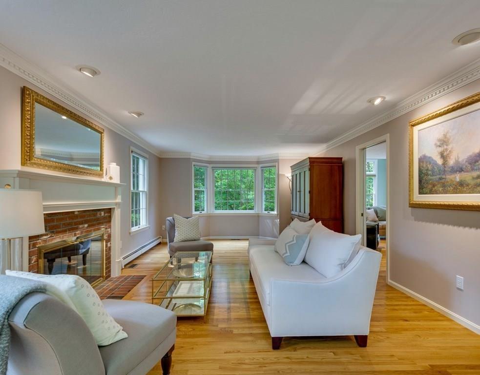 328 Joseph Road Boxborough, MA 01719 - Photo 4 of 34 a living room with furniture and a fireplace