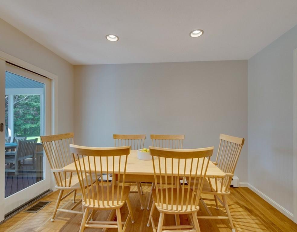 328 Joseph Road Boxborough, MA 01719 - Photo 6 of 34 a view of a dining room with furniture and wooden floor