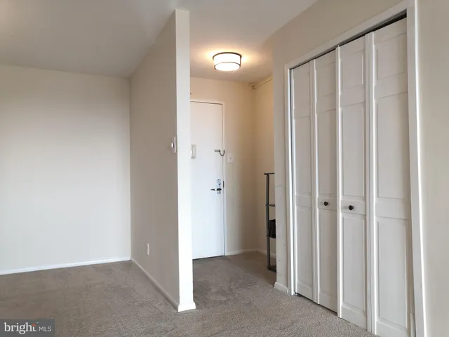 a view of a livingroom with a hallway
