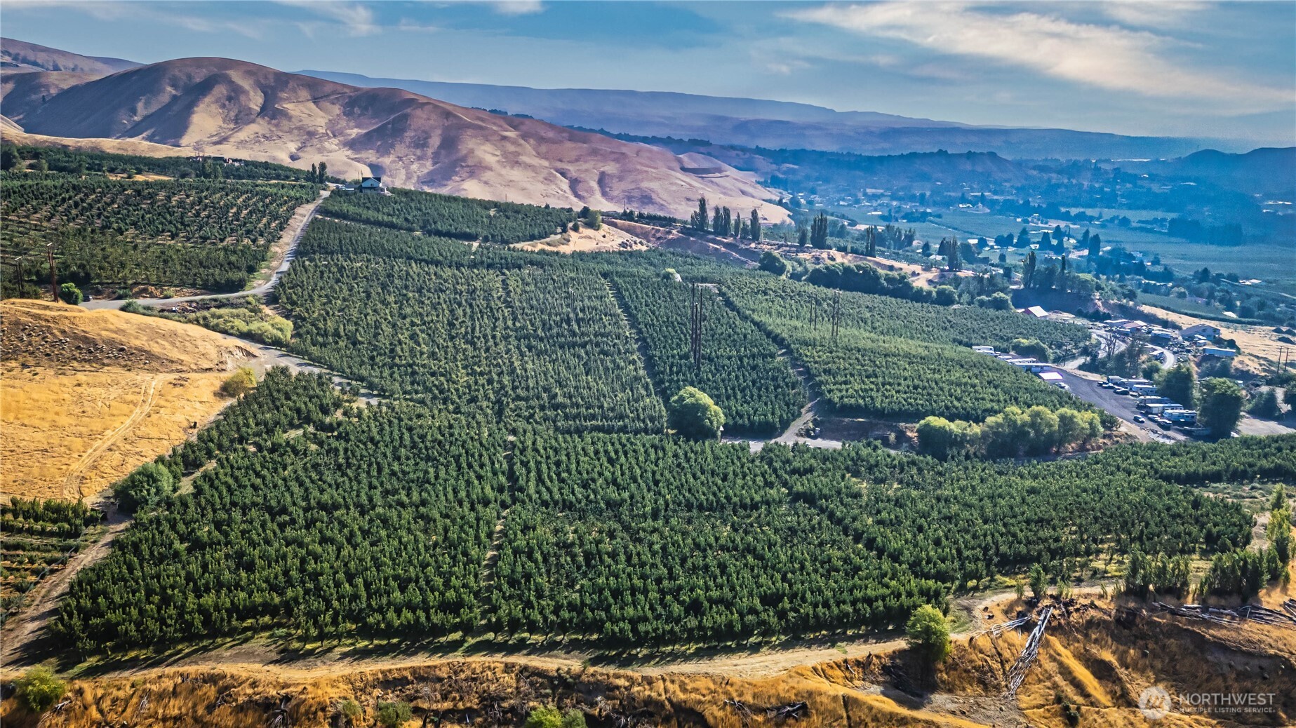 394 Lure Lane Wenatchee, WA 98801 - Photo 4 of 27 a view of a yard with an outdoor space