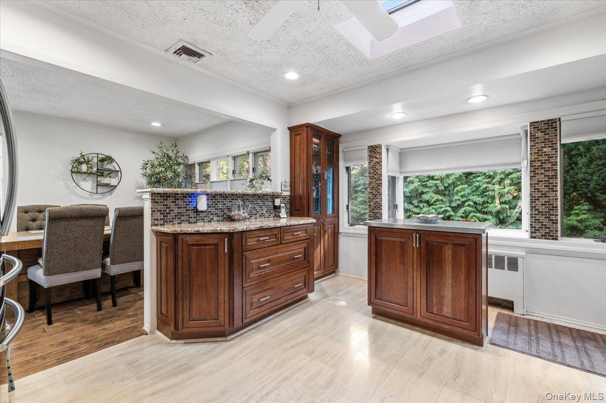 2 Doone Drive Syosset, NY 11791 - Photo 12 of 23 a room with a large window and furniture