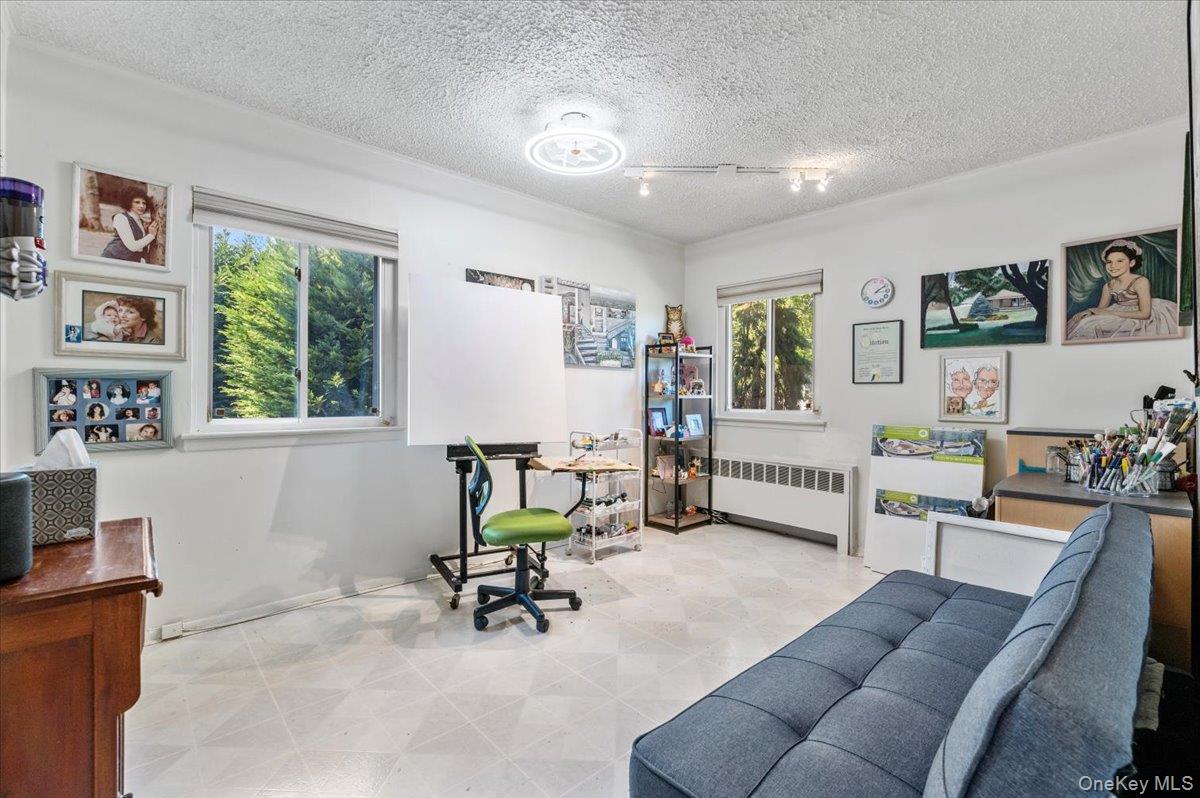 2 Doone Drive Syosset, NY 11791 - Photo 15 of 23 a living room with furniture and a window