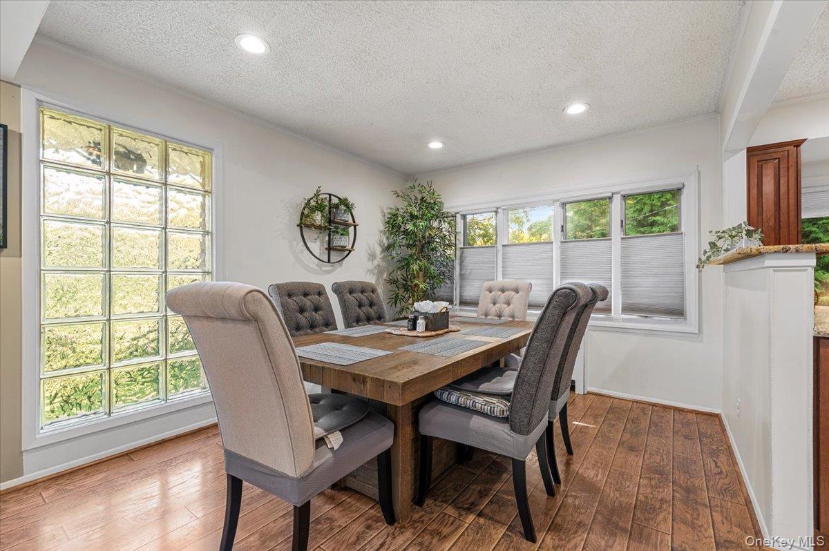 2 Doone Drive Syosset, NY 11791 - Photo 8 of 23 a view of a dining room with furniture window and outside view