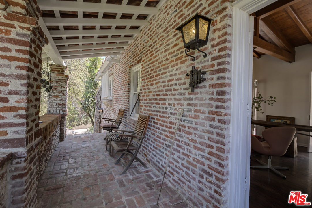 8420 La Tuna Canyon Road Sun Valley, CA 91352 - Photo 3 of 50 a view of balcony with chair and fire pit