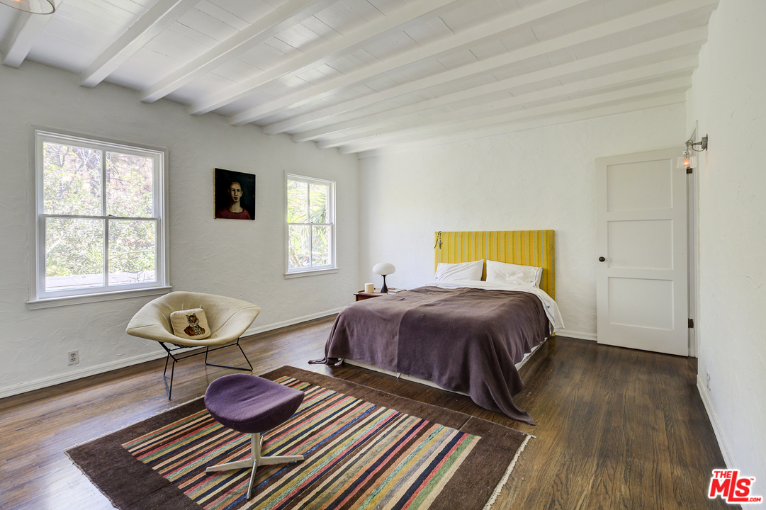8420 La Tuna Canyon Road Sun Valley, CA 91352 - Photo 23 of 50 a bedroom with furniture and a window