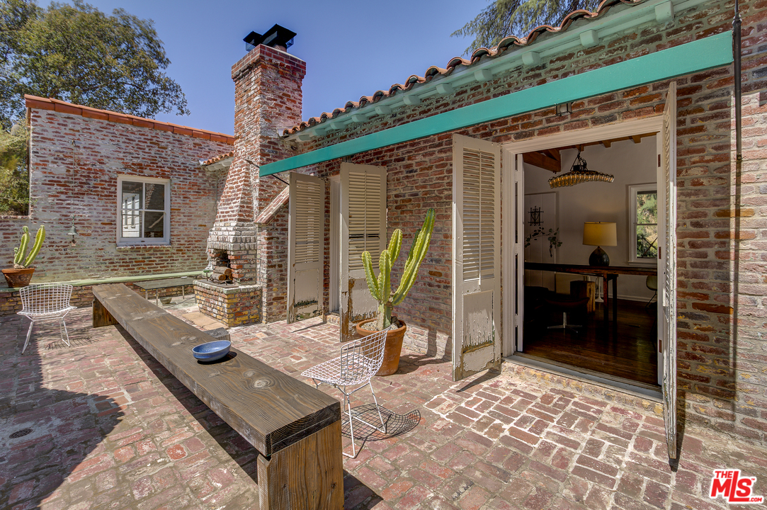 8420 La Tuna Canyon Road Sun Valley, CA 91352 - Photo 29 of 50 a front view of a house with garden