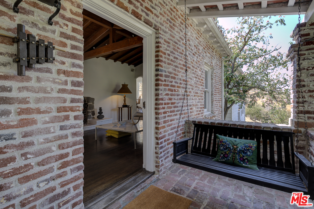 8420 La Tuna Canyon Road Sun Valley, CA 91352 - Photo 32 of 50 a view of a porch with furniture and yard