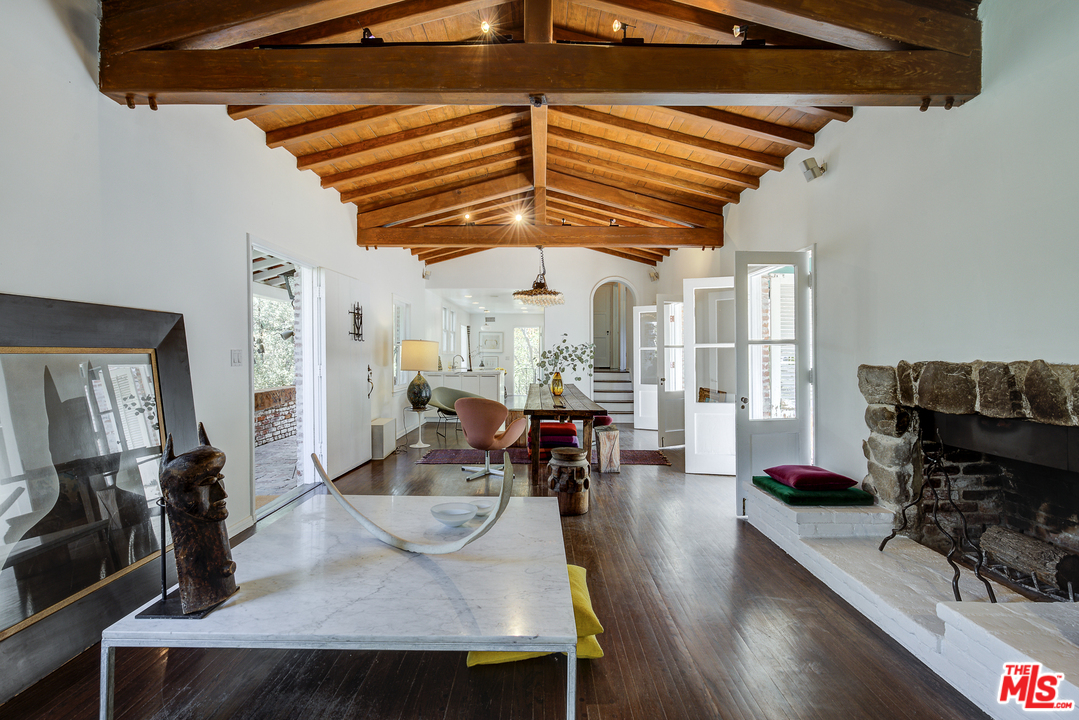 8420 La Tuna Canyon Road Sun Valley, CA 91352 - Photo 7 of 50 a view of a dining room with furniture and wooden floor