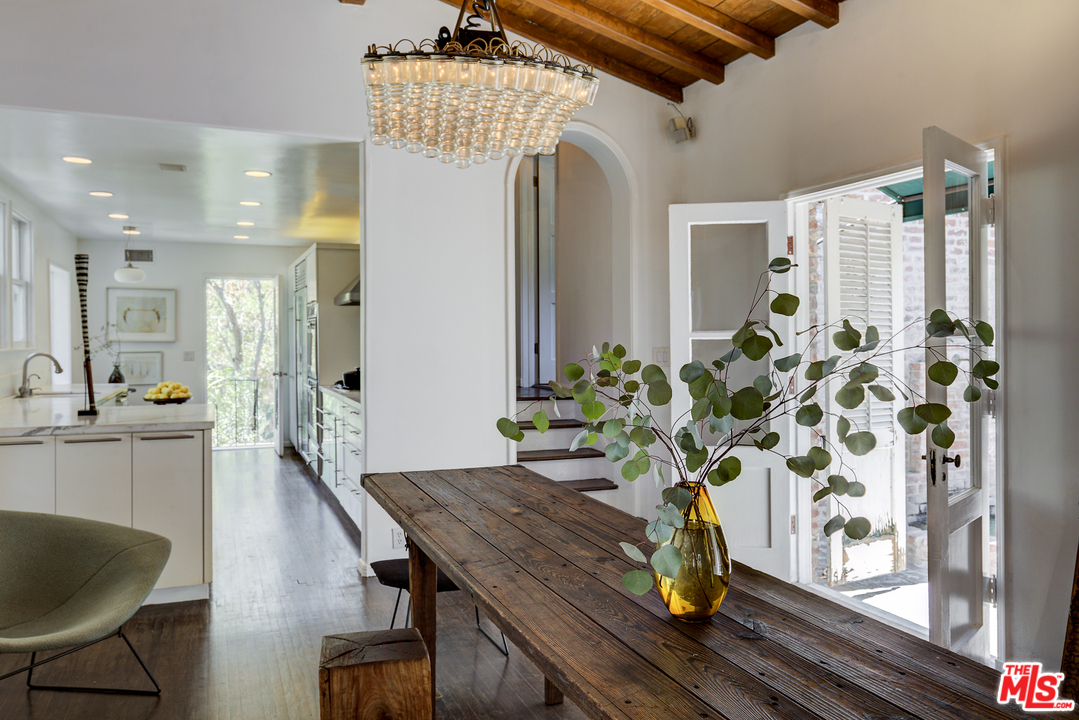 8420 La Tuna Canyon Road Sun Valley, CA 91352 - Photo 9 of 50 a dining room with furniture and wooden floor
