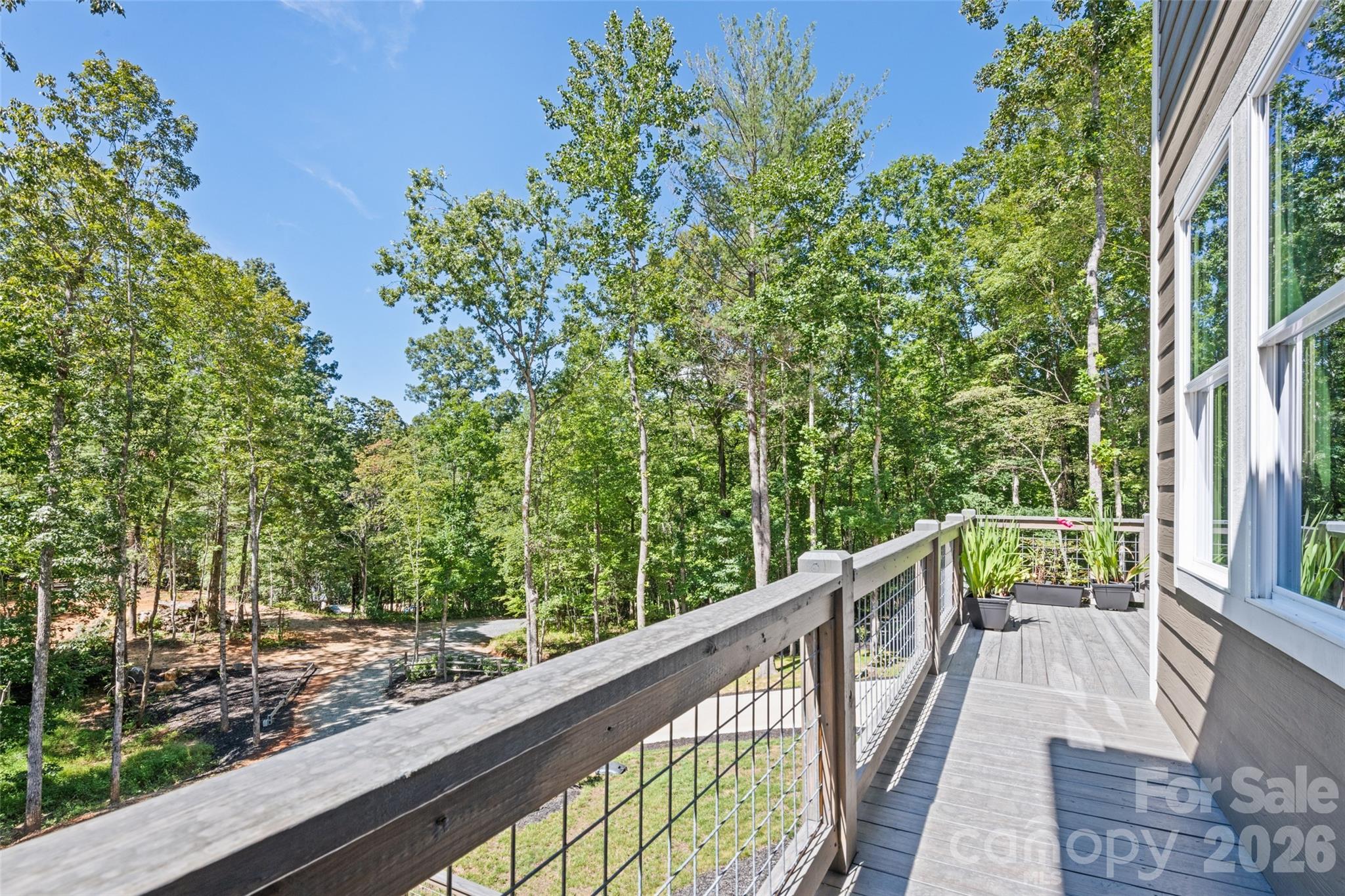 1185 Wallalieu Road Otto, NC 28763 - Photo 35 of 43 a view of a balcony with trees