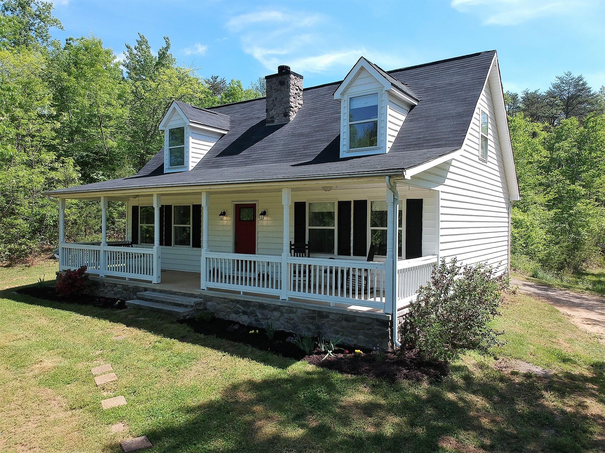 1280 Dryhill Road Ferrum, VA 24088 - Photo 2 of 58 a front view of a house with a yard