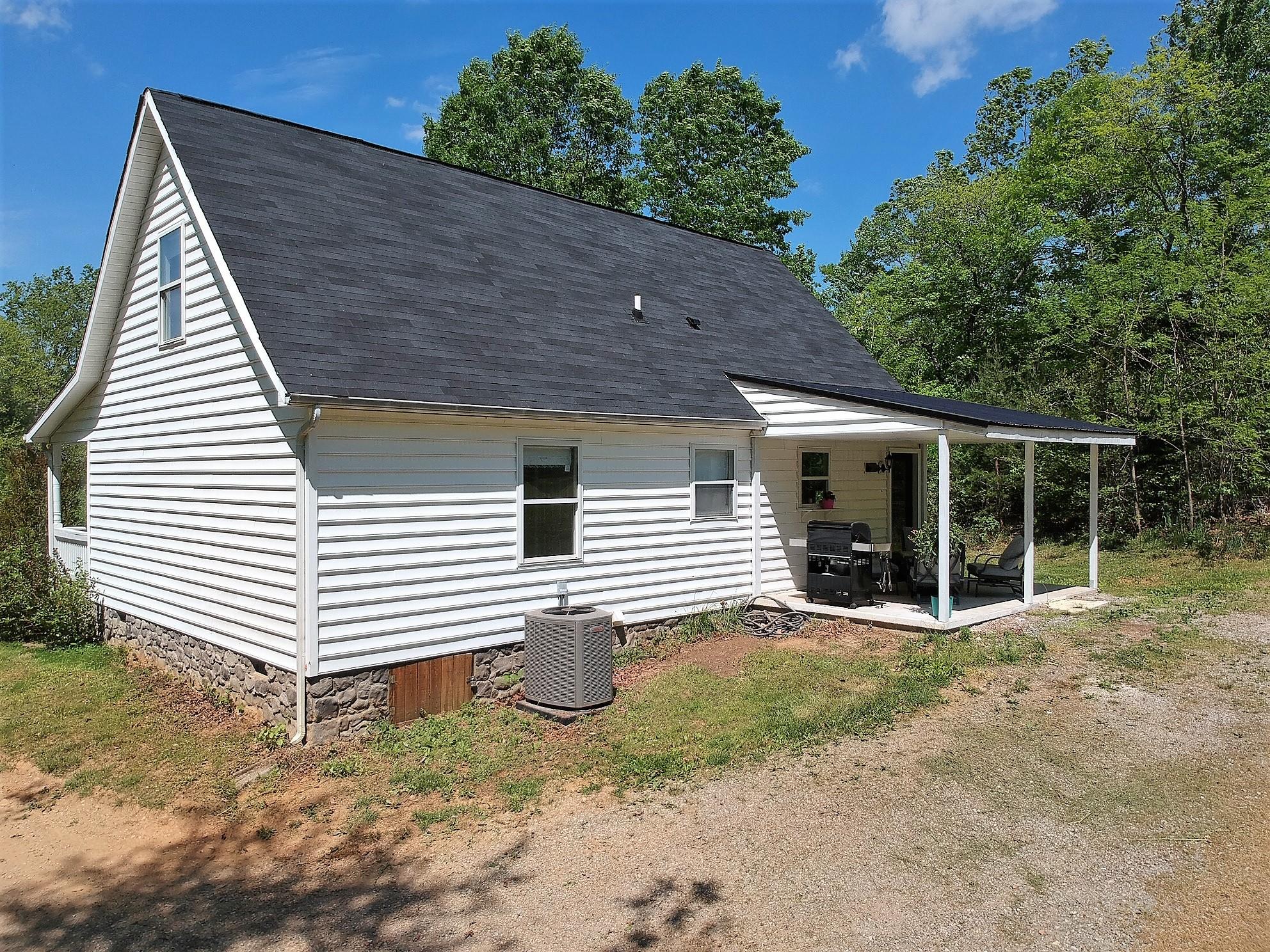1280 Dryhill Road Ferrum, VA 24088 - Photo 47 of 58 a view of a house with a yard and porch