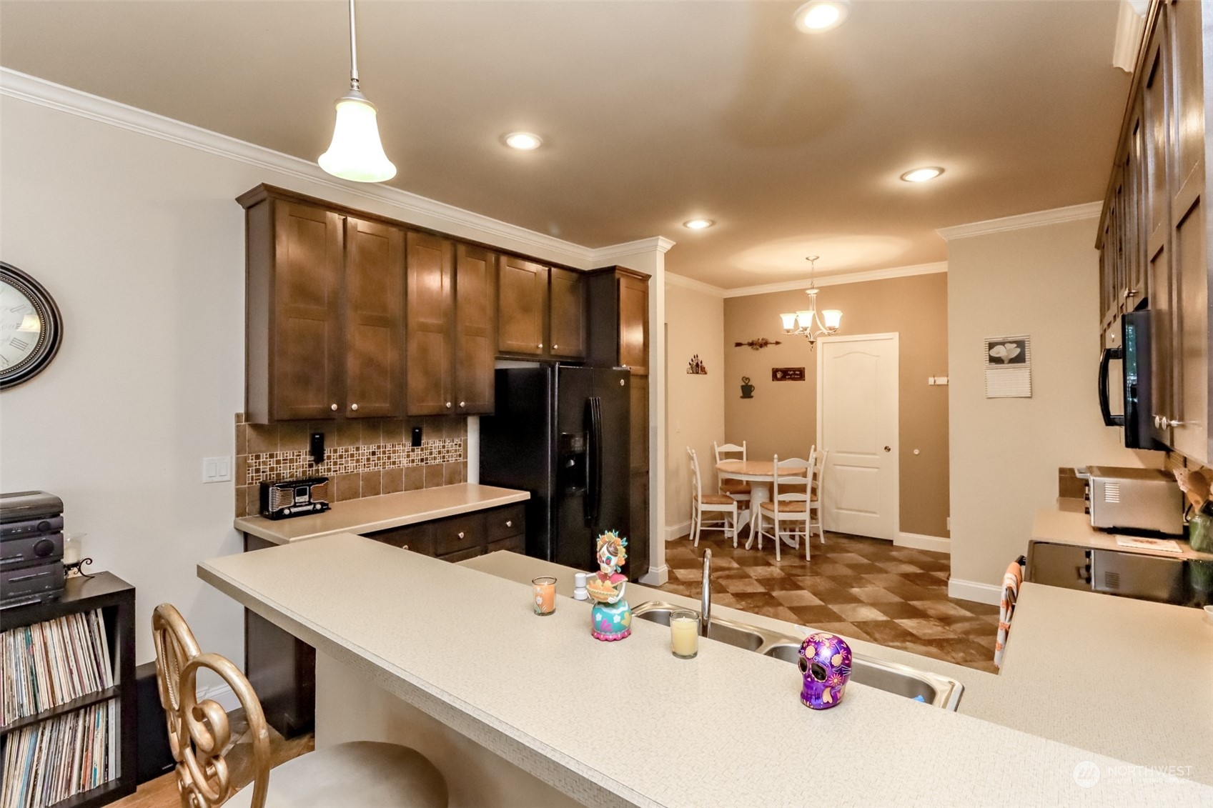828 Mountain Villa Drive Enumclaw, WA 98022 - Photo 11 of 34 a kitchen with sink refrigerator and stove
