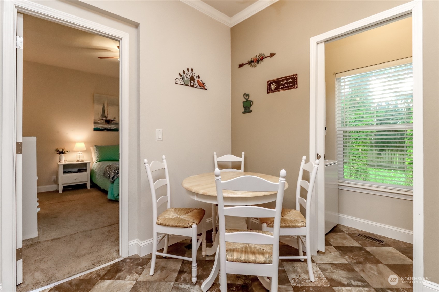 828 Mountain Villa Drive Enumclaw, WA 98022 - Photo 15 of 34 a view of a dining room with a table and chairs