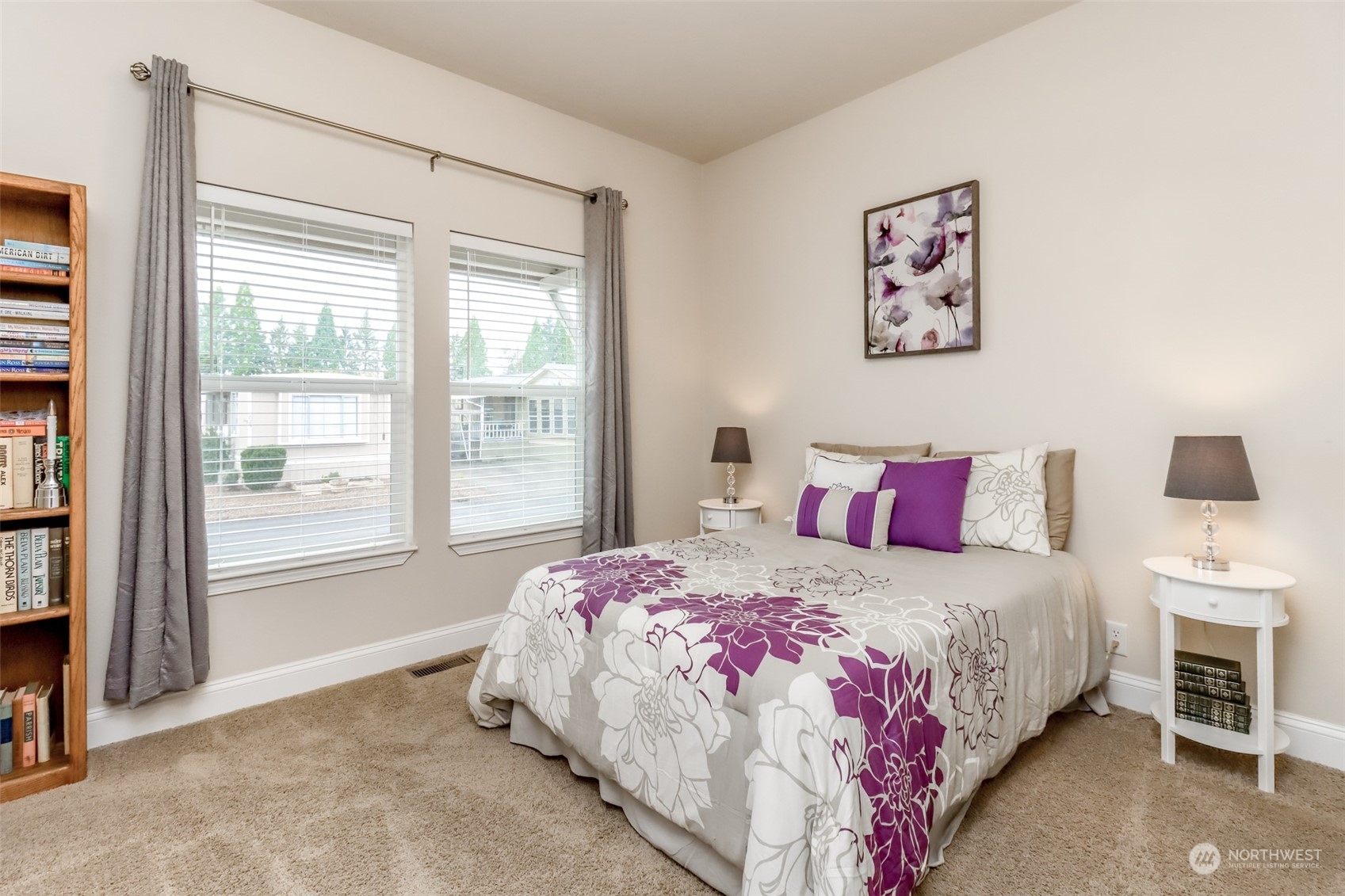 828 Mountain Villa Drive Enumclaw, WA 98022 - Photo 20 of 34 a bedroom with a bed and a flat screen tv