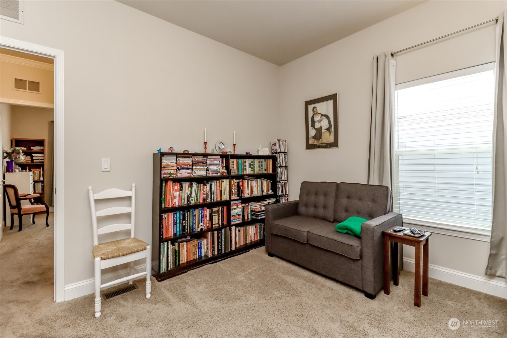 828 Mountain Villa Drive Enumclaw, WA 98022 - Photo 24 of 34 a living room with furniture and a window