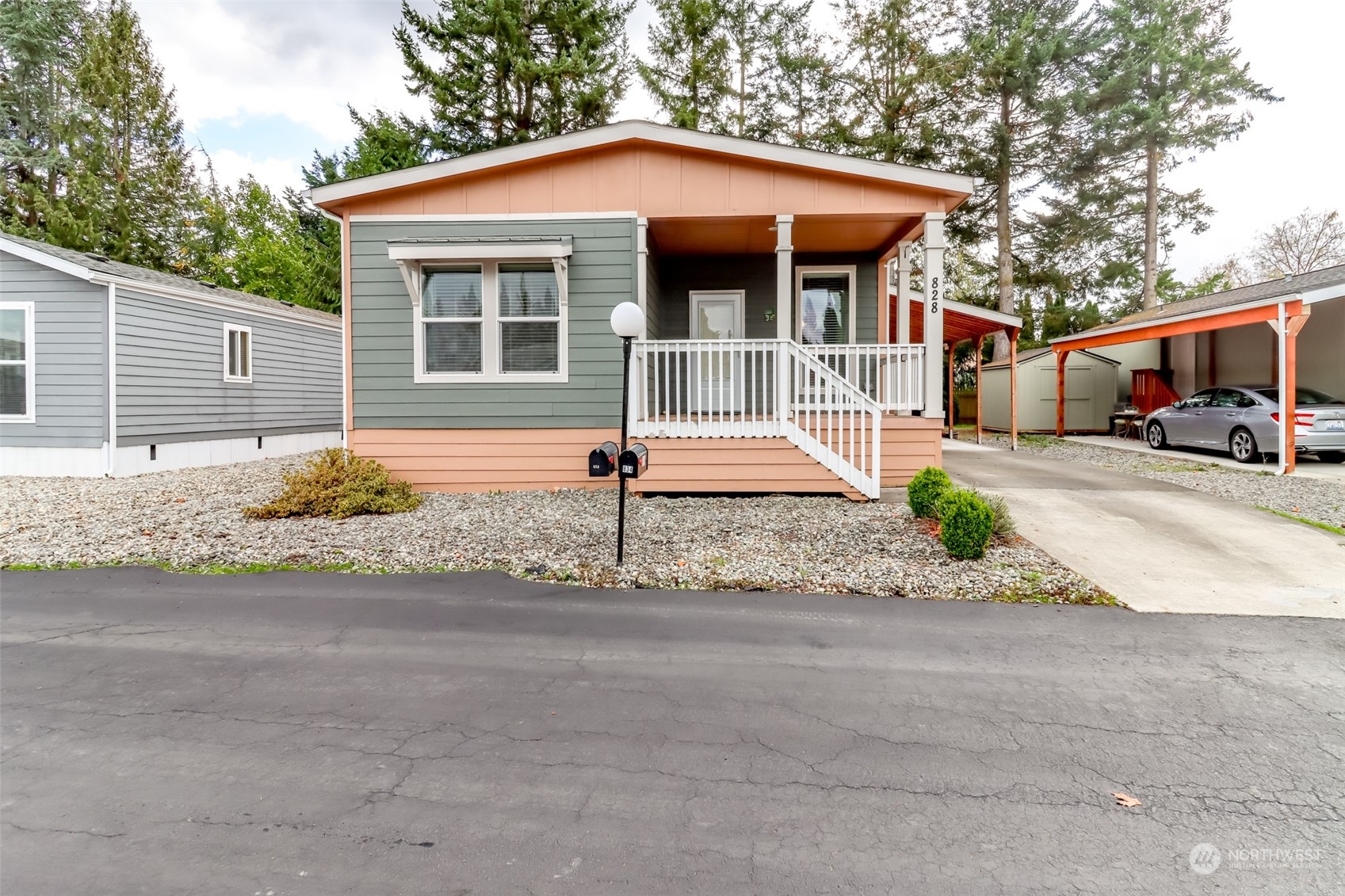 828 Mountain Villa Drive Enumclaw, WA 98022 - Photo 3 of 34 a front view of a house with a yard and potted plants