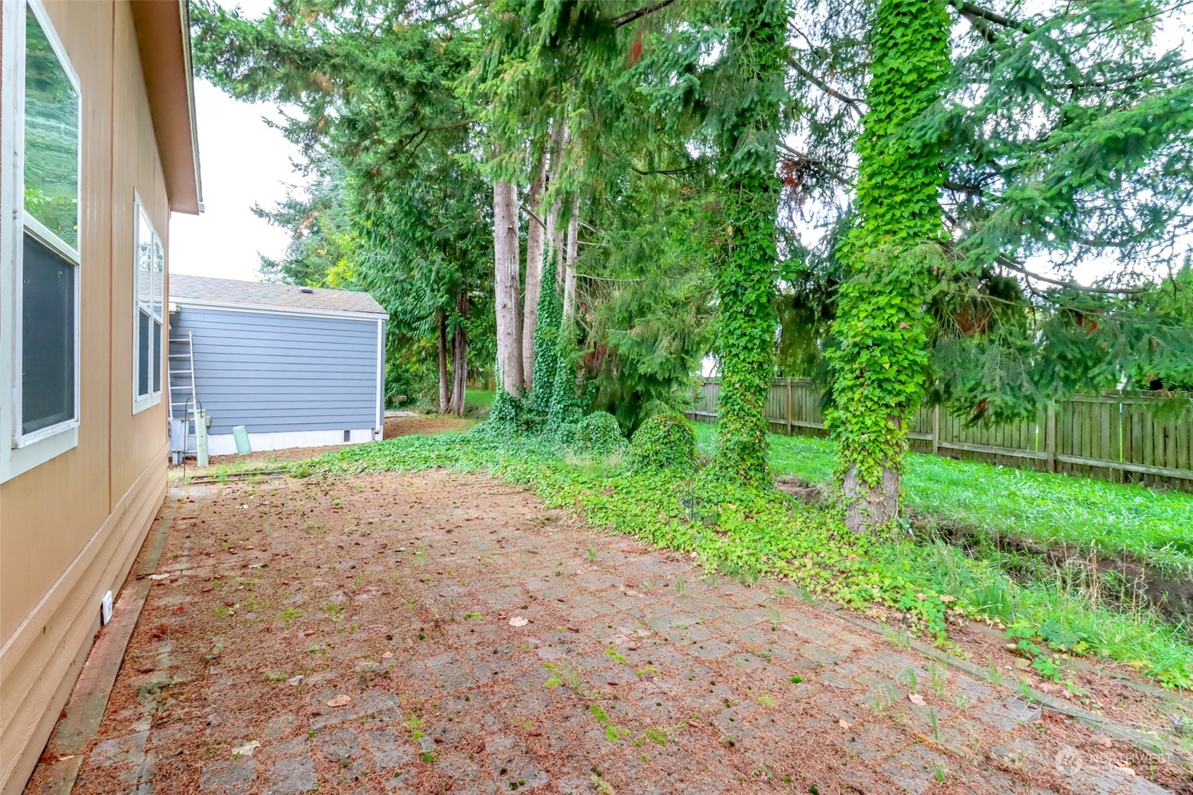 828 Mountain Villa Drive Enumclaw, WA 98022 - Photo 31 of 34 a view of a house with backyard and garden