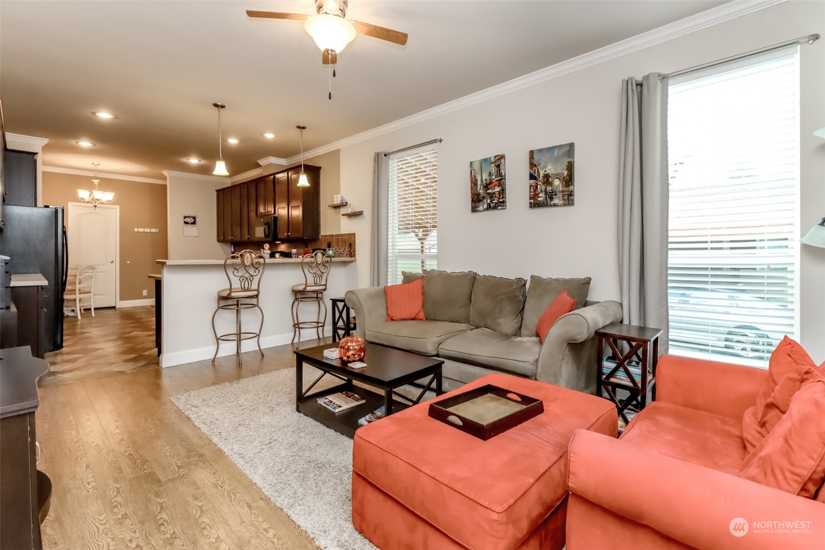 828 Mountain Villa Drive Enumclaw, WA 98022 - Photo 7 of 34 a living room with furniture and a flat screen tv