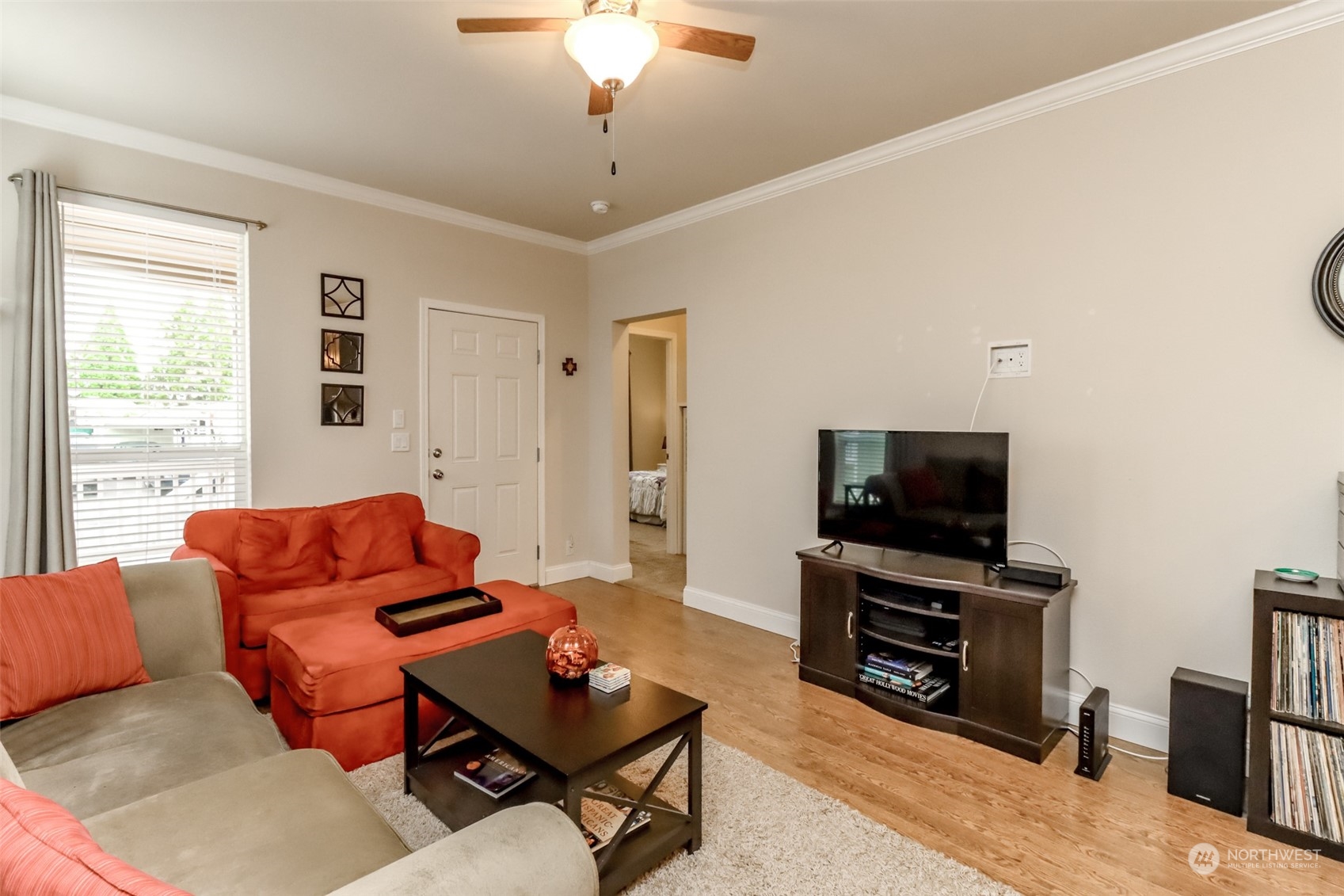 828 Mountain Villa Drive Enumclaw, WA 98022 - Photo 8 of 34 a living room with furniture and a flat screen tv