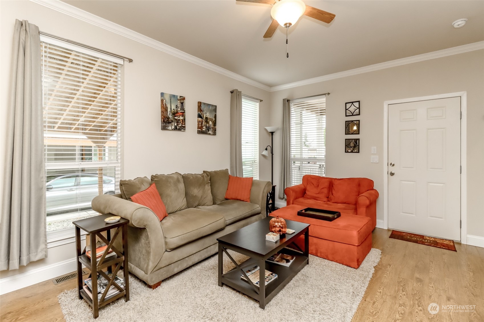 828 Mountain Villa Drive Enumclaw, WA 98022 - Photo 9 of 34 a living room with furniture a ceiling fan and a window