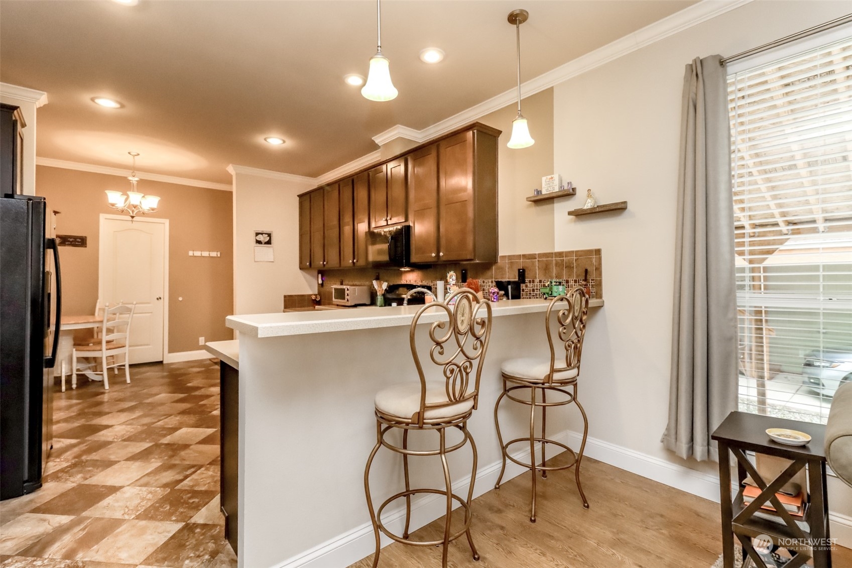 828 Mountain Villa Drive Enumclaw, WA 98022 - Photo 10 of 34 a view of a dining room with furniture window and outside view
