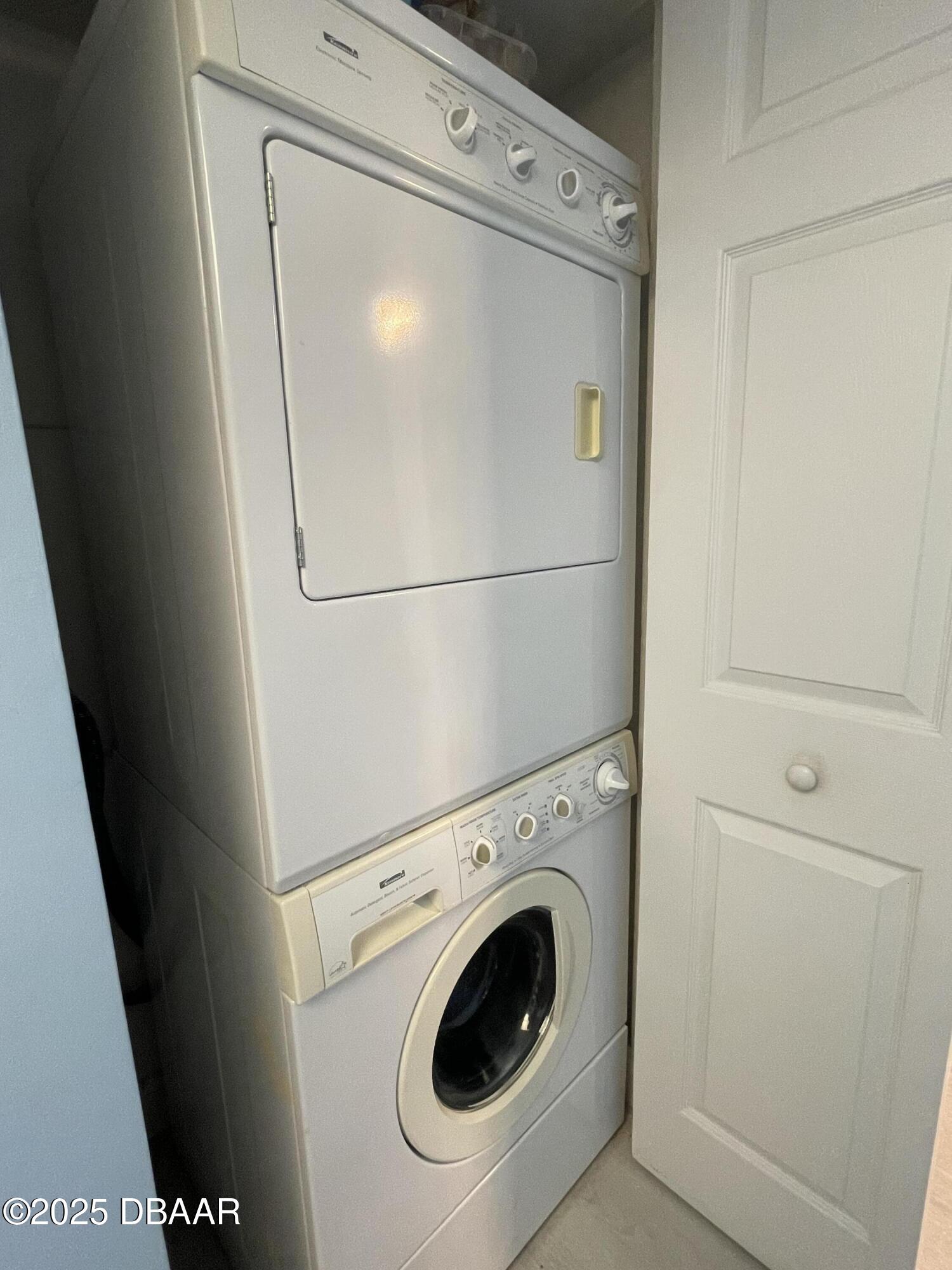 3390 Ocean Shore Boulevard, Unit 101 Ormond Beach, FL 32176 - Photo 14 of 33 a close up view of a washer and dryer