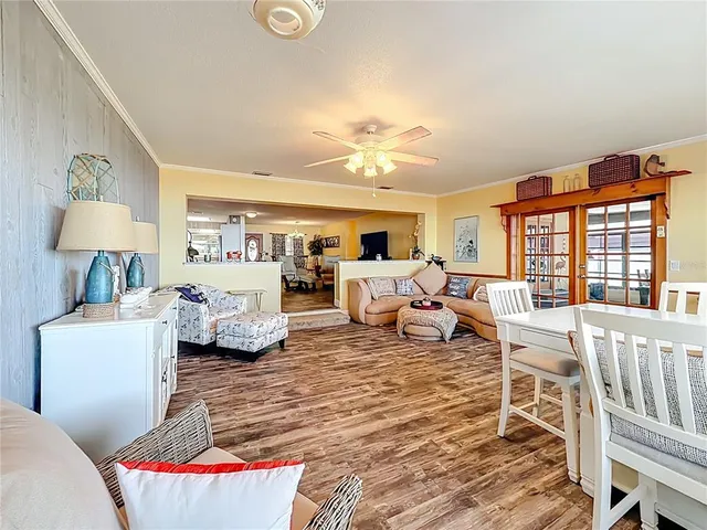 a bedroom with a bed and a television