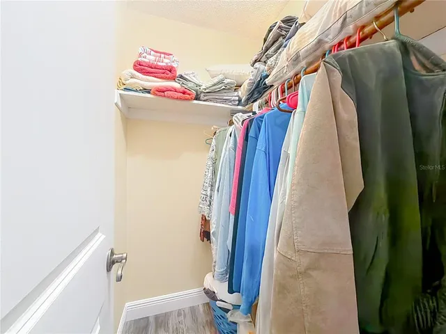 a view of house with outdoor space and swimming pool