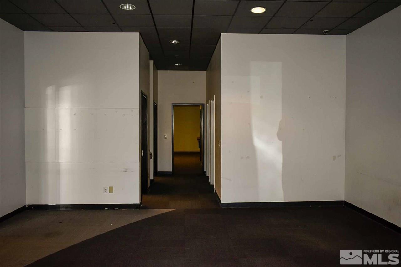 3735 A&b N Carson Street, Unit 3735 Carson City, NV 89706 - Photo 12 of 24 a view of a hallway with wooden floor