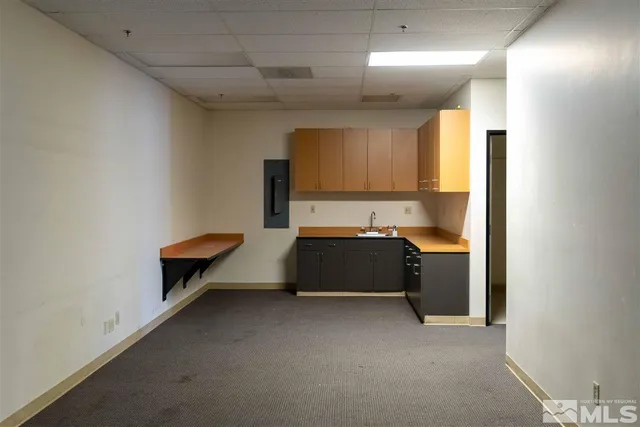 a spacious bathroom with a sink and a bathtub