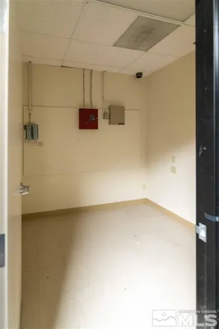 a view of a refrigerator in a kitchen
