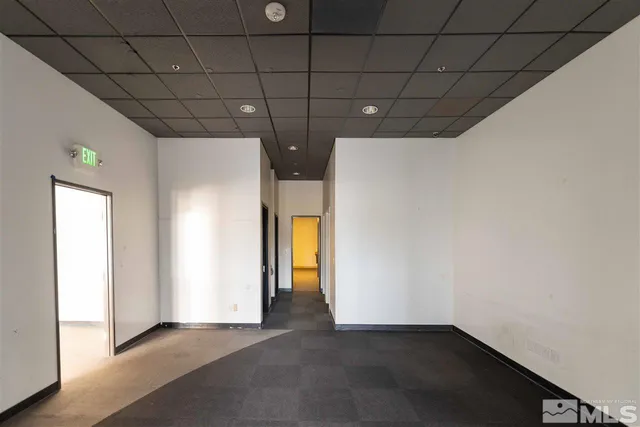 a view of hallway with a window