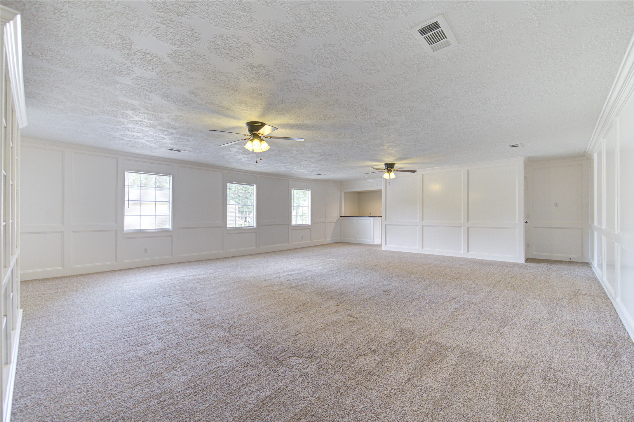 9115 Taidswood Drive Spring, TX 77379 - Photo 34 of 41 This room is unbelievably big! It's a perfect place for the kids to play or let your imaginatio go wild and convert it into a mother-in-law suite with a kitchen and bath. It is a bonus you don't see in other homes!